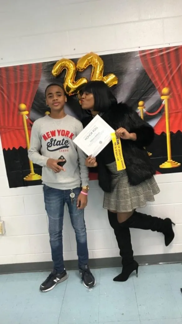 Ebony with Dakarai at honor roll ceremony
